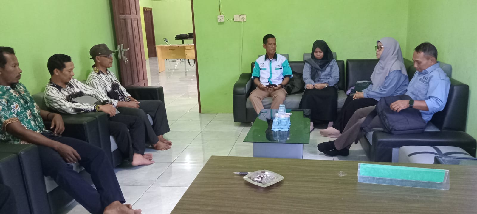 Monitoring dan Evaluasi Puskesos-SLRT Desa Sidomulyo, Kecamatan Wanaraya